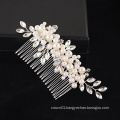 Handmade bridal hair comb made by pearls and crystals